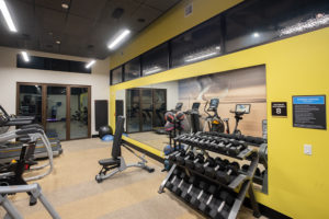 Fitness center with weights.
